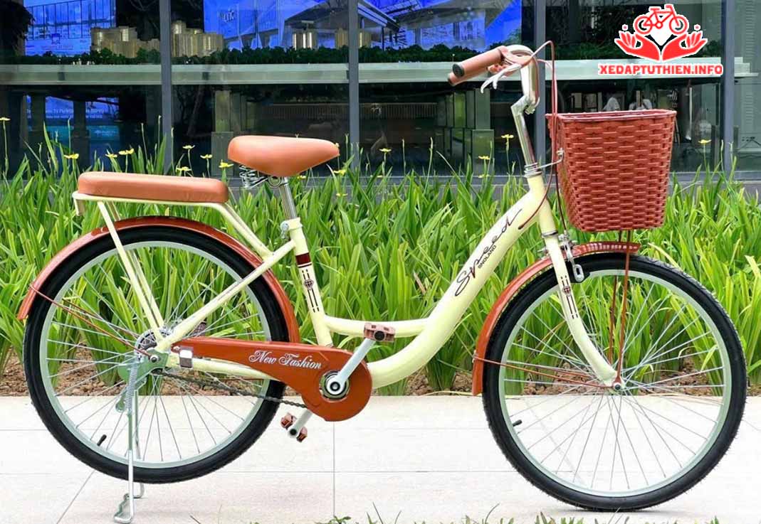 xe đạp từ thiện thời trang thiên nga khung thép màu vàng